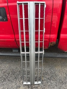 lot 53 image: Chevy Grill Replacement - Grey CV07027GA see images
