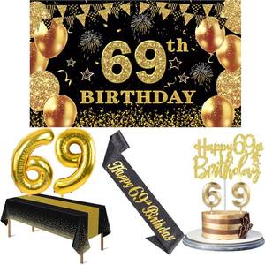 lot 33100 image: Birthday Decorations Men Women with 69th Birthday Banner, Black and Gold Table Cloth, Number Balloons, Large Sash, Cake Topper and Candles 69th birthday  - Retail $20