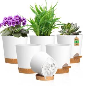 lot 33120 image: WSMKSZ 4 inch Self Watering Pots for Indoor Outdoor Plants, 6 Pack Plastic Flower Planters with Drainage Holes and Removable Saucers, Plant Pots with Wicking Rope, Modern Decor, White Brown - Retail $15