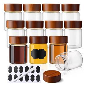 lot 37193 image: 12 Pack 2oz Glass Shot Bottles with Caps, 60ml Borosilicate Wellness Shot Glass Bottles, Dishwasher & Freezer Safe, Reusable Ginger Shots Jars with Lids for Juicing - Retail $19