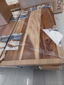 lot 14049 image: Hampton Bay 4 ft. L x 25 in. D Finished Saman Solid Wood Butcher Block Countertop in with Live Edge Retail $349