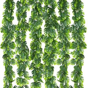 lot 9439 image: Dolicer 6Pcs Artificial Vines Greenery Garland, 5.6Ft Fake Hanging Greenery Plants Monstera Leaf Vines Tropical Palm Leaves Garland for Home Garden Porch Patio Hawaiian Party Indoor Outdoor Decor