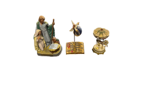 lot 4873 image: Christmas Nativity Figurine, Angel Book Decor, and Carousel Music Box Set - Retail $35