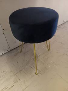 lot 1105 image: Velvety Black stool with gold legs.