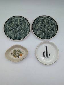 lot 1109 image: Four trinket platestrays.