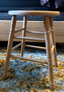lot 19 image: Vintage Solid Wood Tan Stool  Classic Turned-Leg Design