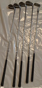 lot 56 image: Set of Golf Irons  Precision Clubs for Consistent Play