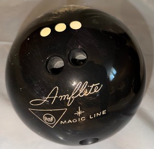 lot 67 image: Amflite by Magic Line Bowling Ball  Classic Black Finish