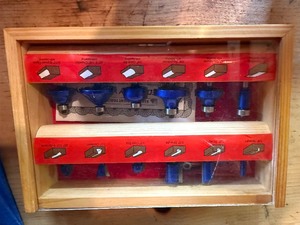 lot 12 image: Harbor Freight 12 Piece Router Bit Set w Wood Case & Accesories