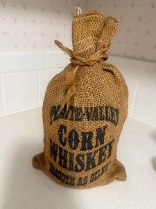 lot 42 image: Vintage McCormick Platte Valley Straight Corn Whiskey ceramic decanterjug
