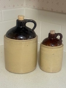 lot 43 image: Vintage Stoneware Style Jug Decanter Pair w Corks