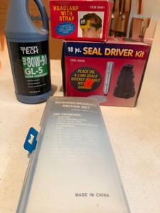 lot 58 image: Automotive Tool & Garage Supply Lot  Seal Driver Kit, Bearing Driver Set, Headlamp & Gear Oil