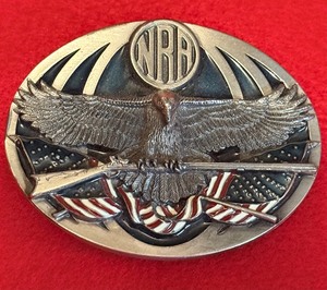 lot 67 image: Vintage 1994 NRA Golden Eagles Limited Edition Eagle & Rifle Enamel Belt Buckle