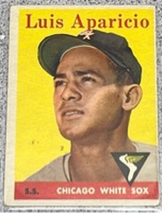 lot 101 image: 1958 Topps Baseball Card #85 - Luis Aparicio Chicago White Sox