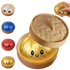 lot 18397 image: Glitter Dumpling, Glitter Dumpling Squishy with Box (Gold)