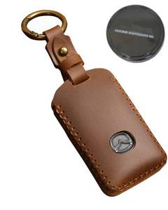 lot 20395 image: SIEVEN Key Fob Case, Compatible with Mazda 3,3 Hatchback,6,CX-5,CX-50,CX-3,CX-30,CX-9,CX-90,MX-5,CX-70 2020-2026, Remote Car Key Protector Case with Keychain, Comes with a Leather Conditioner (Brown)