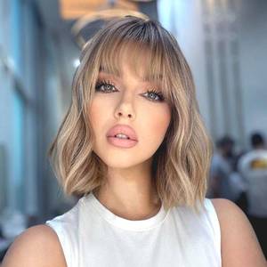 lot 2382 image: ATAYEA Blonde Wig with Bangs Short Wavy Wigs for Women Ombre Honey Blonde Curly Shoulder Length Bob Wig Synthetic fiber Wigs for Cosplay Daily Party Use (14 Inch)