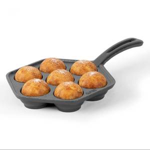 lot 11784 image: Commercial CHEF Danish Aebleskiver Pan, Pre-Seasoned Cast Iron, Seven Sections For Mini Puffs and Pancake Balls, Works on All Cooktops Including Induction, Outdoor Cookware for Grills, CHCI4105 (Used)