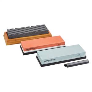 lot 18323 image: (stone has corner chipped off)Amazon Basics Whetstone Knife Sharpening Stone Set, Double-sided 4001000 and 30008000 Grit Stones, Flattening Stone with Angle Guide, Non-Slip Bamboo Base, 3 Count, Black & Grey