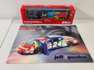 lot 111 image: Jeff Gordon DuPont NASCAR Die-Cast Transporter and Poster Set