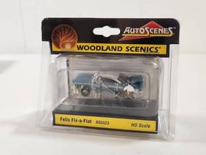 lot 134 image: Woodland Scenics AutoScenes Felix Fix-a-Flat HO Scale Model AS5523