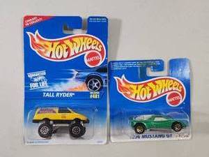 lot 167 image: Hot Wheels 1996 Mustang GT Short Card and Tail Ryder Die-Cast Cars