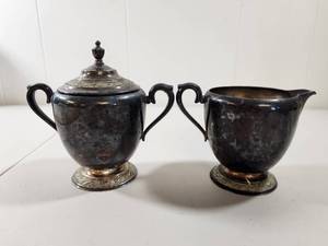 lot 207 image: Evandale W. M. Rogers Silver Plated Sugar Bowl and Creamer Set