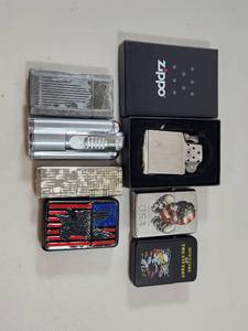 lot 237 image: Zippo Lighter Collection Mixed Designs and Themes