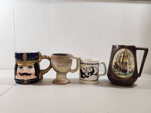 lot 327 image: Collection of Four Novelty Coffee Mugs