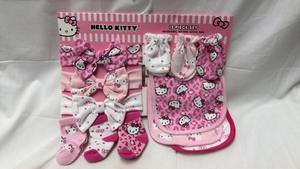 lot 7 image: Hello Kitty 12 Piece Baby Set Headbands Mittens Socks Bibs