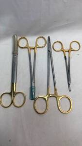 lot 62 image: Professional Surgical Instrument Set with Gold-Plated Handles