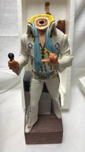 lot 103 image: Elvis Presley Collectible Whiskey Decanter by  McCormick