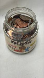 lot 160 image: Heinz Baby Food Jar with Coins Collection