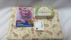 lot 239 image: Baby Care Bundle with PAW Patrol Pacifier and Yardley Soap
