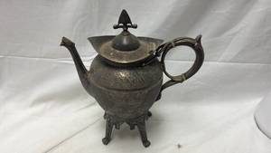lot 272 image: Ornate Metal Teapot with Decorative Stand and Engravings