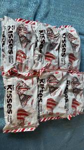 lot 2044 image: Hersheys Kisses Candy Cane Holiday Chocolates 12 Bags.