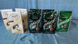 lot 2078 image: Lindt Lindor Holiday Chocolate Truffle Gift Box Collection
