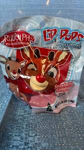 lot 2112 image: Rudolph Red-Nosed Reindeer Lip Pops Strawberry Lollipops 12 Count