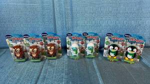 lot 2133 image: Holiday Pooper Walking Candy Dispensers Set - Reindeer, Yeti, and Penguin