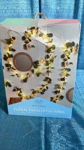 lot 3078 image: West & Arrow Floral Eucalyptus LED Light Garland 2-Pack