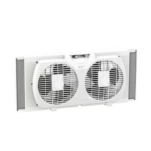 lot 5764 image: $49 9 in. Twin Window Fan with Manually Reversible Airflow Control