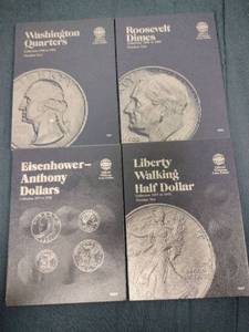 lot 52924 image: Whitman branded coin folders - Washington Quarters, Roosevelt Dimes, Eisenhower Anthony Dollars, Liberty Walking Half Dollar