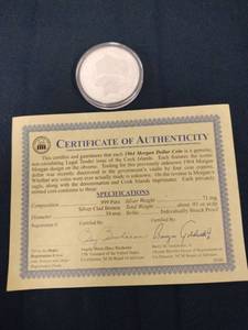 lot 59485 image: 1964 Morgan Dollar with Certificate of Authenticity
