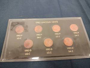 lot 59498 image: 7 Piece 1982 Lincoln PD Cent Uncirculated Collection LG C SM C LG Z SM Z