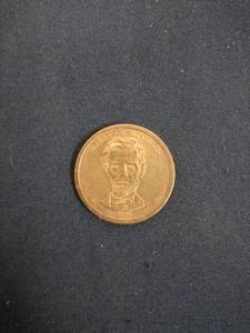 lot 59664 image: United States Abraham Lincoln Presidential $1 Coin