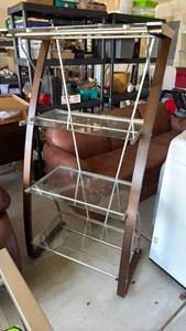 lot 303 image: Shelf with glass shelves 60x30x16 located in garage