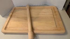 lot 1132 image: Wooden cutting board and rolling pin 24x16