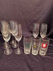 lot 1204 image: Mixed Glass Drinkware Set - Champagne Flutes and Beer Glasses