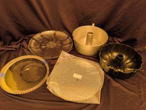 lot 1231 image: Bundt pan, springform, tart molds and round mirror