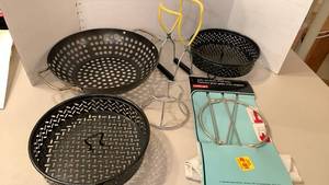 lot 1314 image: Canning tongs, jelly strainer, metal baskets, and grill pan